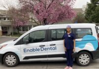 Photo of Sampada Deshpande, D.D.S., in front of van