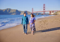 Photo of Dr. Deshpande and husband on beach